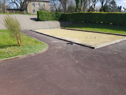 a skateboard on a ramp in a parking lot at Magnifique villa avec piscine intérieure in Saint-Pois