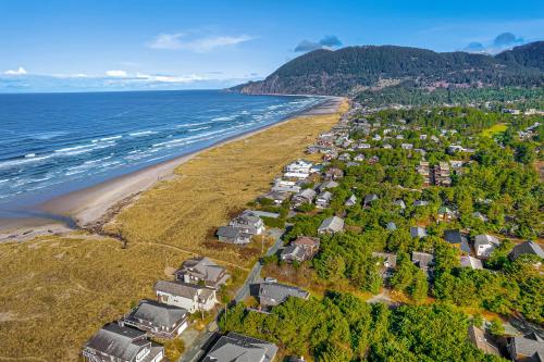 an aerial view of a beach next to the ocean at Sweet Dream MCA #155 in Manzanita