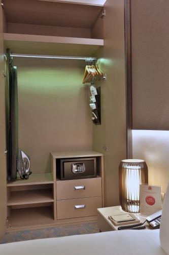 Dosso Dossi Hotels & SPA Downtownにあるベッド