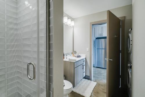 a bathroom with a toilet and a sink at Sable 86 in Minneapolis