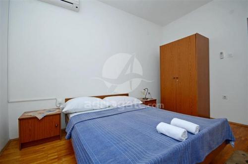 Postel nebo postele na pokoji v ubytování Apartment Lara