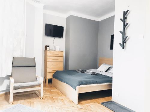Llit o llits en una habitació de Daszyńskiego 7 by Homeprime