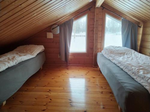 Vuode tai vuoteita majoituspaikassa Kylpyläsaari camping