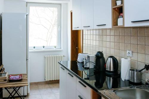 ครัวหรือมุมครัวของ NN Apartment