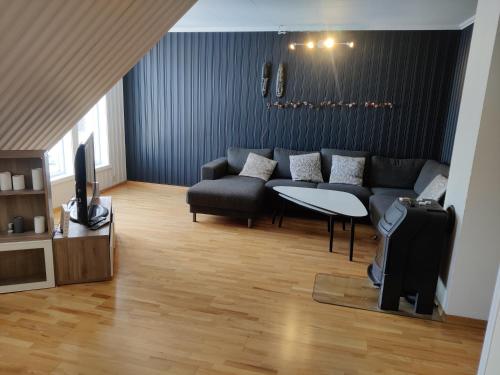 Posezení v ubytování FeelHome 2-bedrooms apartment Vestregata Nord