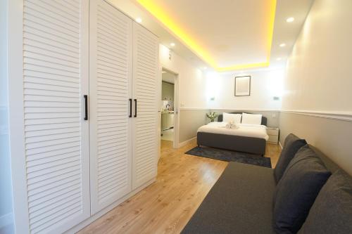 Postel nebo postele na pokoji v ubytování Cihangir VAV Suites