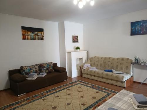 Гостиная зона в Apartments Domovik Beljaeva,5а