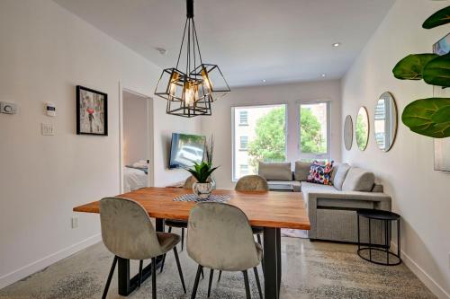 a dining room with a table and chairs at Amazing 1Bedroom Great Location presented by TripMontreal in Montreal