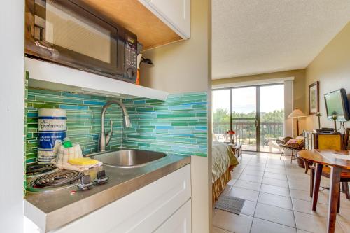 a kitchen with a sink and a counter top at Pirates Bay B206 in Fort Walton Beach