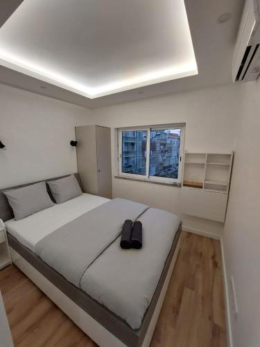 Postel nebo postele na pokoji v ubytování Lisbon South Bay Rooms