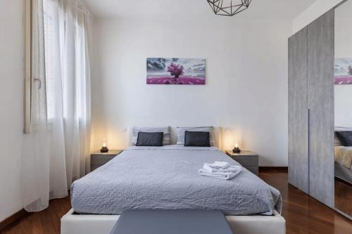 Ένα ή περισσότερα κρεβάτια σε δωμάτιο στο Il Loft di Vanni