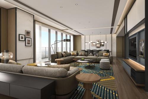 Uma área de estar em Sheraton Zhaoqing Dinghu
