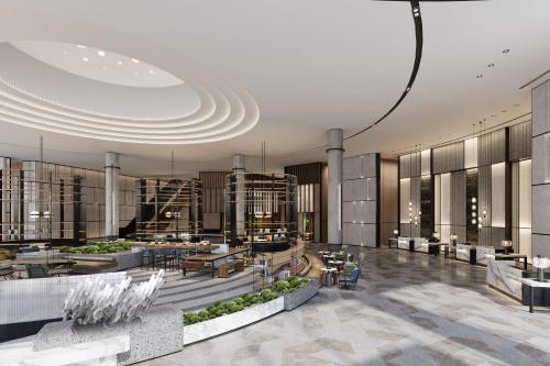 Uma área de estar em Sheraton Zhaoqing Dinghu