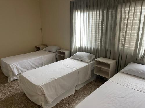 Una cama o camas en una habitación de ApartSanMartin561