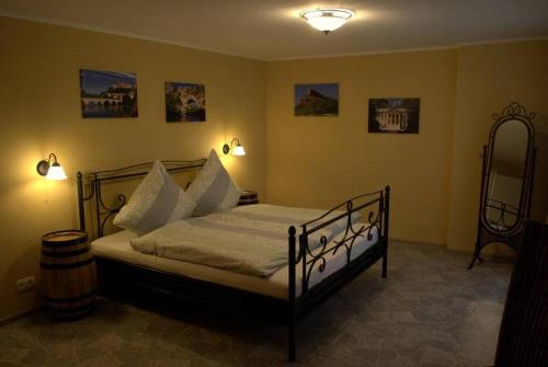 Кровать или кровати в номере CasaVitis Erholung am Weinberg