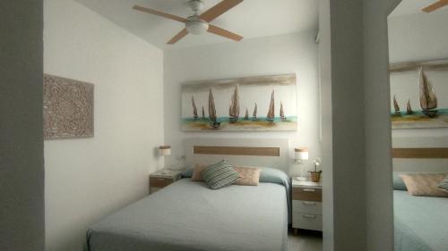 Posteľ alebo postele v izbe v ubytovaní VFT Apartamento "El Mar de Cádiz", en Primera Linea