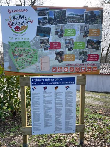 a sign for the strawberryfield strawberry festival at Les Chalets du Périgord in Sarlat-la-Canéda