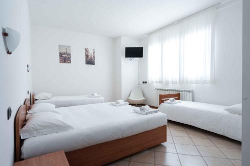 Postel nebo postele na pokoji v ubytování Wayco Rooms