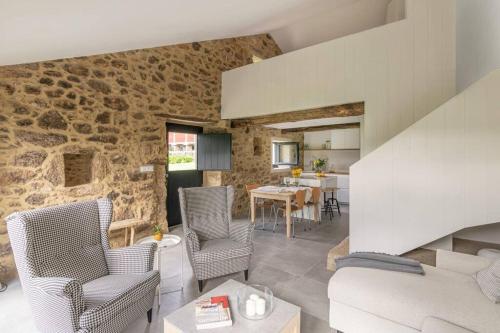 Posezení v ubytování A casa de Abaixo, aloxamento rural
