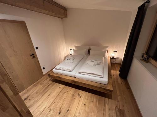 Appartements Plusにあるベッド