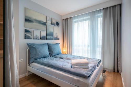 Ένα ή περισσότερα κρεβάτια σε δωμάτιο στο Old Bank Apartment