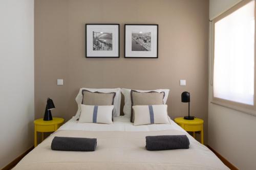 Ένα ή περισσότερα κρεβάτια σε δωμάτιο στο Casa da Raquel