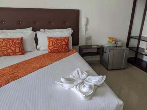 Hotel Palmeras De Luzにあるベッド