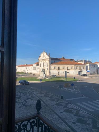 a view of a building from a balcony at Casa do Rossio in Estremoz