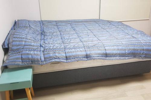 Postel nebo postele na pokoji v ubytování Yeongtong Family House