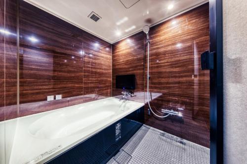 Ett badrum på Hotel Lotus Okayama Adult Only