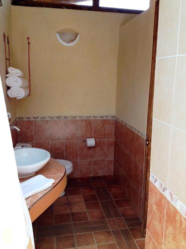 Koupelna v ubytování Cabañas La Cascada