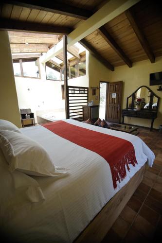Postel nebo postele na pokoji v ubytování Cabañas La Cascada