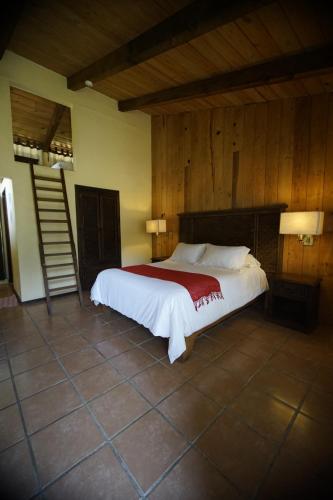 Postel nebo postele na pokoji v ubytování Cabañas La Cascada