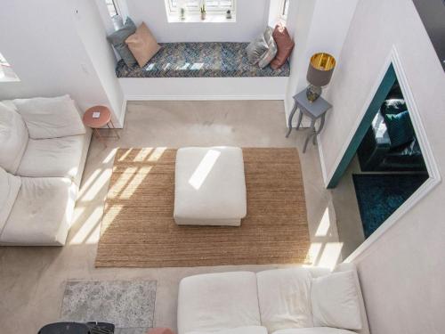 an overhead view of a living room with a white couch at 12 person holiday home in Sønder Omme-By Traum in Sønder Omme