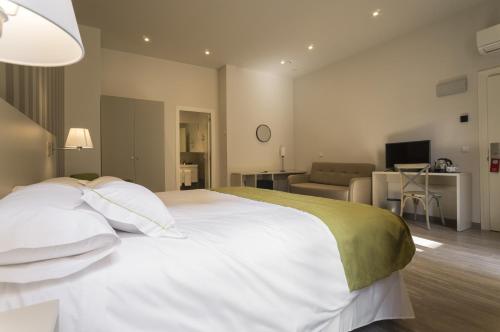Postel nebo postele na pokoji v ubytování Hotel San Lorenzo Boutique