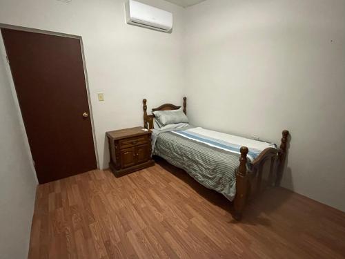Postel nebo postele na pokoji v ubytování Bonita Casa completamente Amueblada