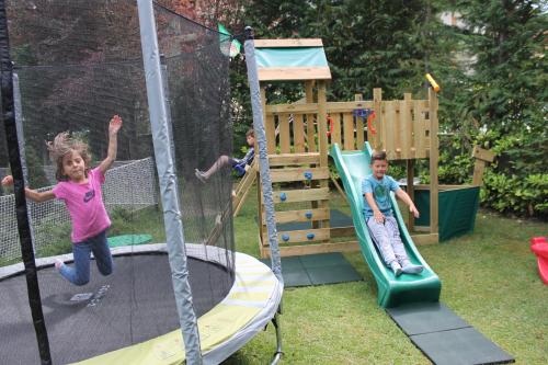 a group of children playing on a playground at Grand Hotel Principe in Limone Piemonte