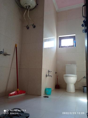 Koupelna v ubytování Bakshi Home Stay
