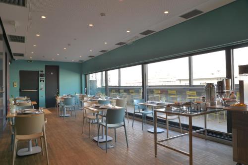 Restaurant ou autre lieu de restauration dans l'établissement Athenaeum K 29