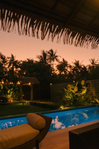 Kolam renang di atau dekat dengan Domu Mia Villa Siargao