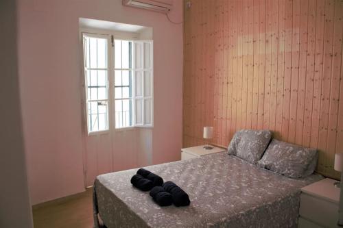 Postel nebo postele na pokoji v ubytování Apartamento en la Plaza del Salvador.