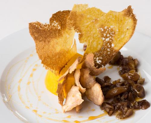 a plate of food with fried food and beans at Villa Morneto - Adults Only in Vignale Monferrato