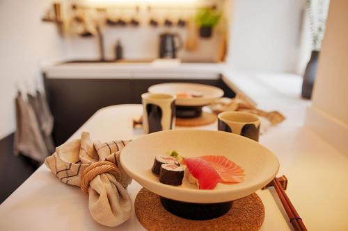 a bowl of food sitting on top of a counter at Chase Apartments-Boutiquehotel Style II in Würzburg