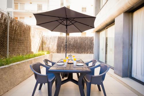 Uma varanda ou outra área externa em Atenea Park Suites & Apartments