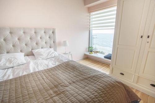 En eller flere senge i et værelse på MojeMiędzyzdroje 1006