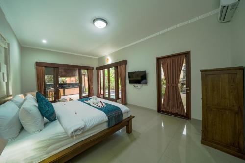 Letto o letti in una camera di Three Brothers Bungalows & Villas