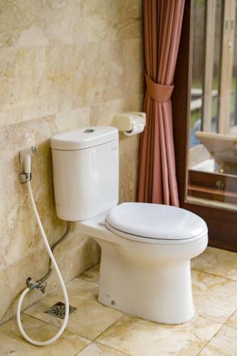 Bagno di Three Brothers Bungalows & Villas