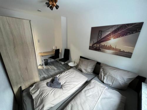 Säng eller sängar i ett rum på OELTALAS Immobilien GmbH