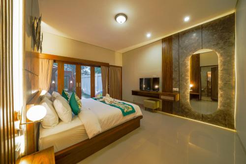 Letto o letti in una camera di Three Brothers Bungalows & Villas