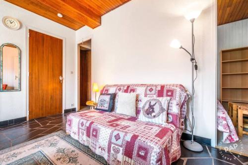 Ένα ή περισσότερα κρεβάτια σε δωμάτιο στο Apt Morzine 1000